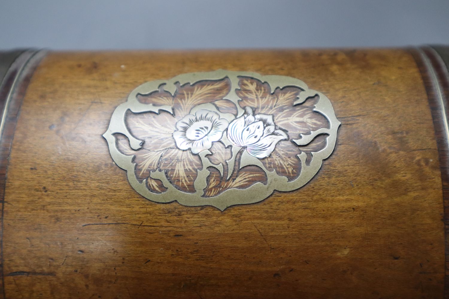 A Victorian domed topped inlaid and crossbanded walnut tea caddy, 23cm